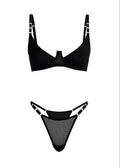 Black bikini set with white accents on a white background