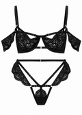 Black lace lingerie set on a white background