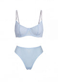 Light blue bikini set on a white background