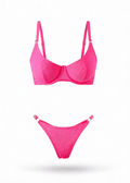 Pink bikini set on a white background