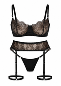 Black lace lingerie set with garter belt on a white background