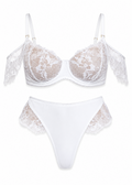 White lace bra and panties set on a white background
